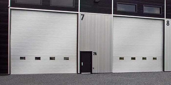 fix bent garage door in Mission